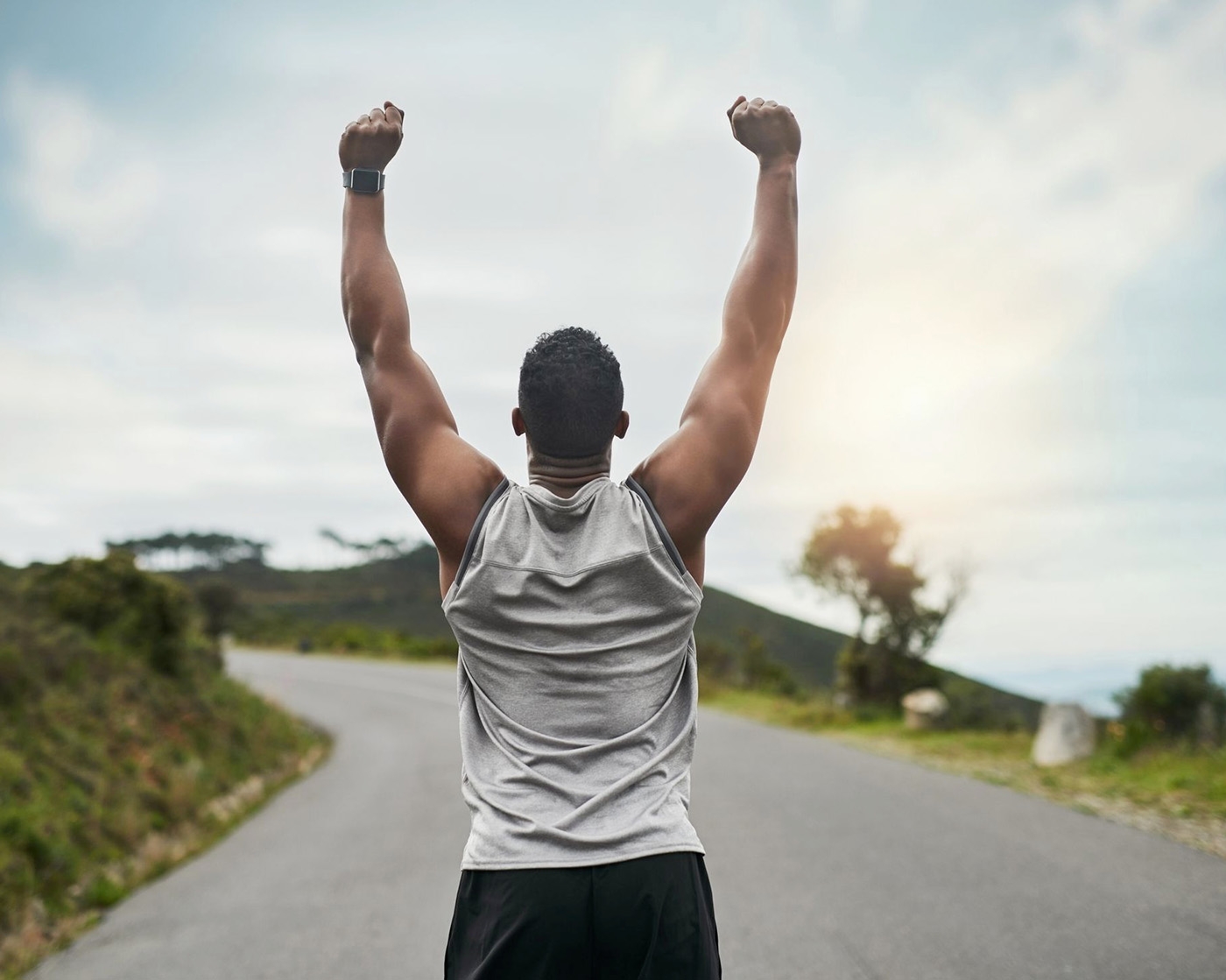 runner celebrating victory